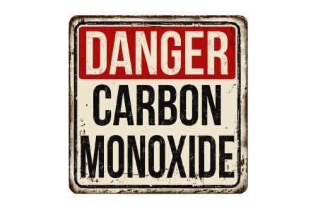 Panneau vintage indiquant un risque au monoxyde de carbone